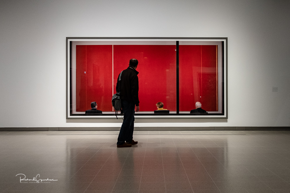 image taken in the hayward gallery focusing on the visitors viewing the Gursky images