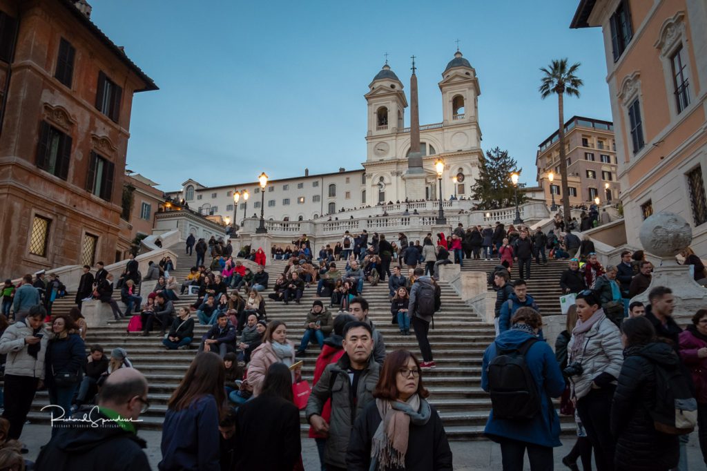 travel photography - travel photograher - colour image from a visit to rome this one from the spanish steps with the crowds of tourists covering the majority of the steps