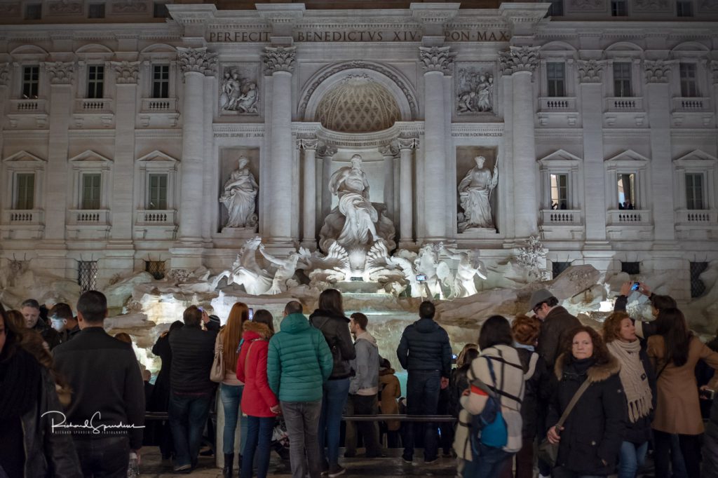 image from the trevi fountain square shoot around 20:00 still lots of tourists stood in front of the fountain (february images)