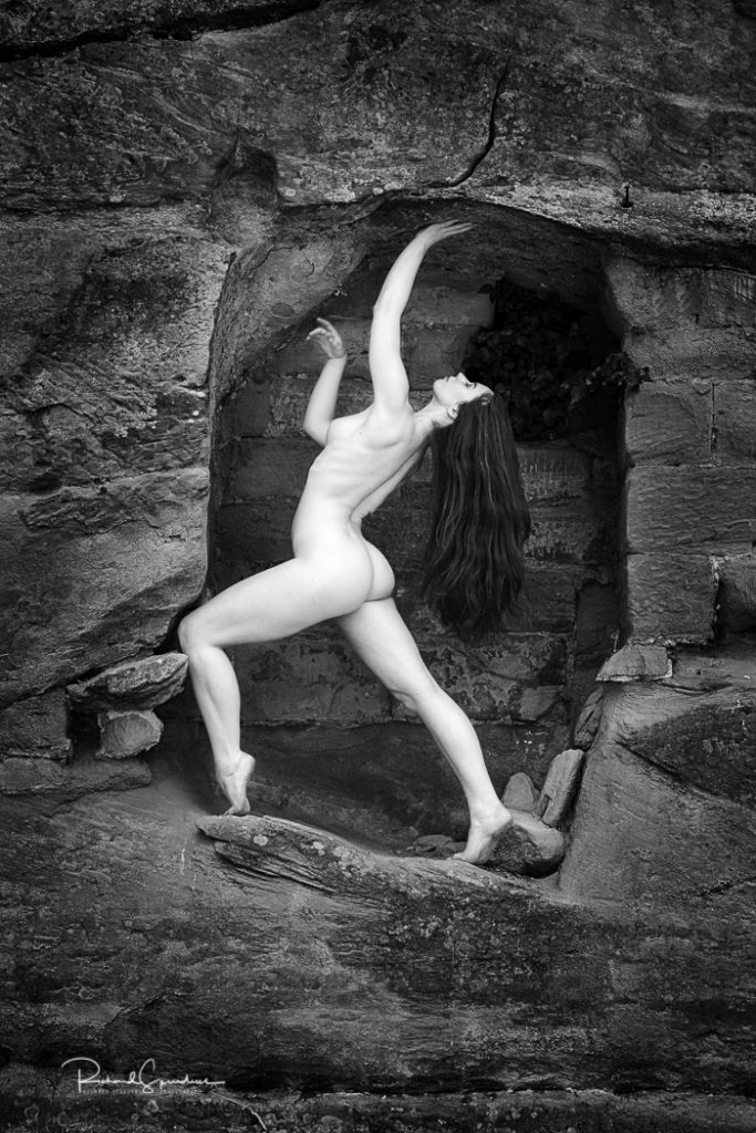 artristc nude photograher - artristc nude Phtography - november print of the month is a monochrome figure study of the model elle beth in a sandstone rock opening itled rough and smooth