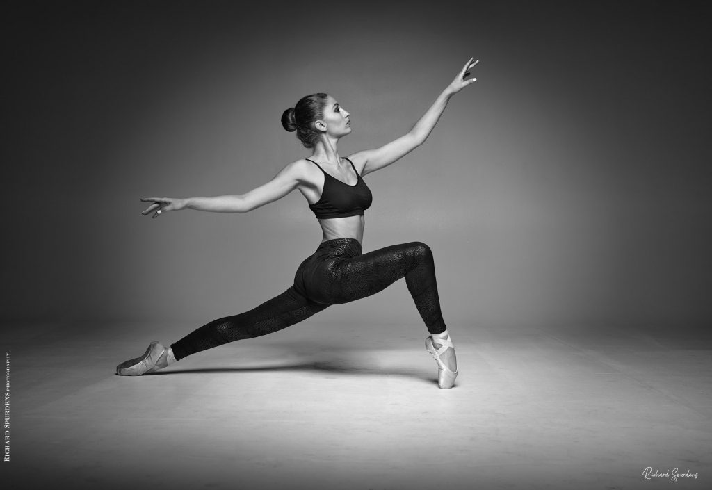 Dance Photographer - Dance Photography - dancer her front leg bent and held on poinet