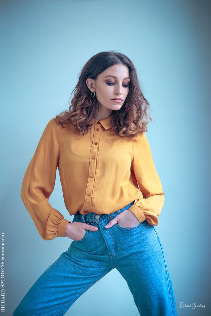 Fashion Photography - Fashion Photographer - col;our image of model in yellow blouse and blue jeans